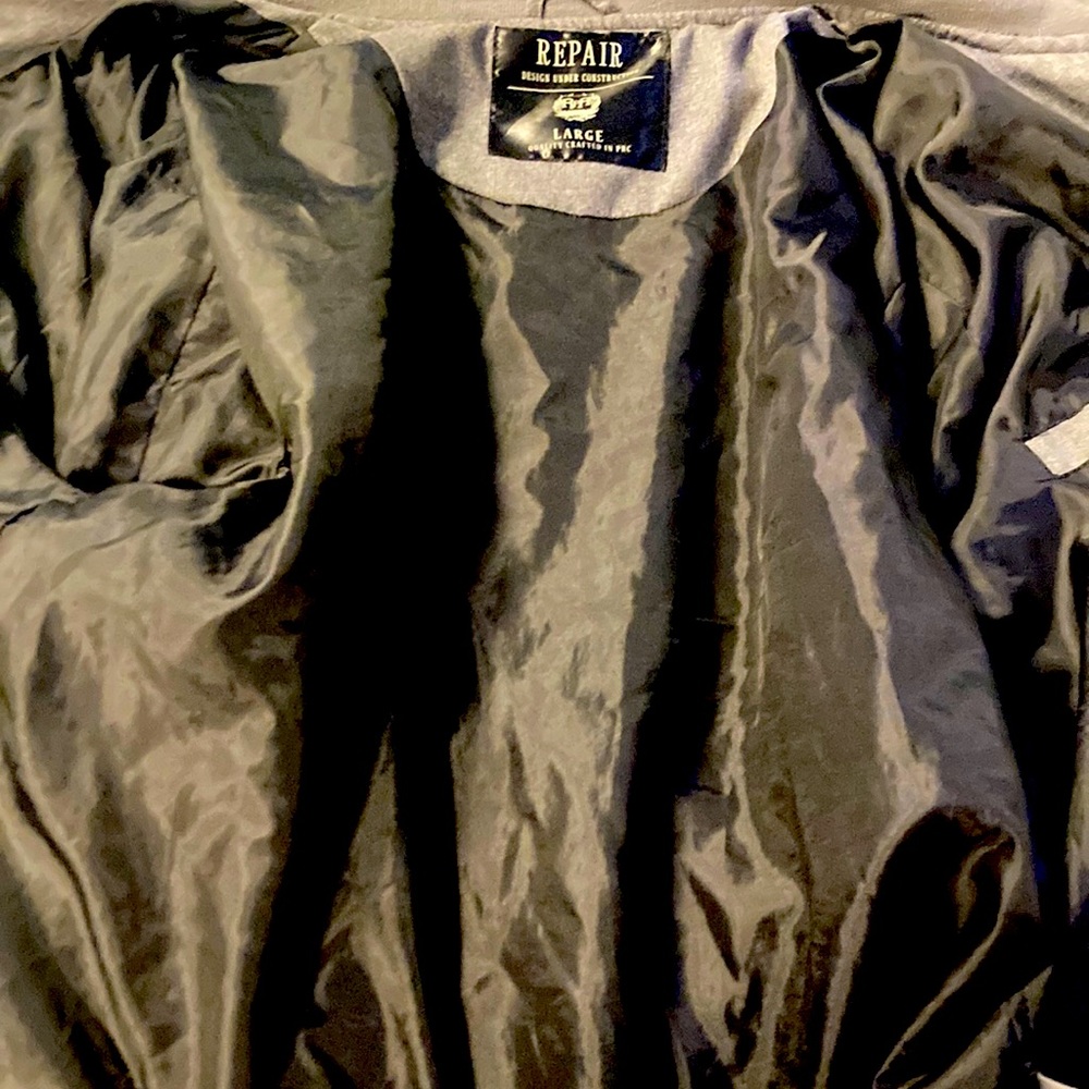 The brand is repair and the color is grey and is a large
